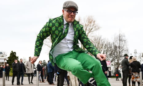 Racegoer Andrew Gattase wearing a shamrock blazer before racing on day three of the Cheltenham Festival.