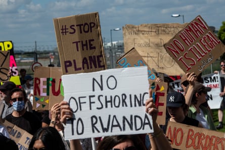 ‘No offshoring to Rwanda’, ‘No human is illegal’, ‘Stop the plane’ and ‘No borders’