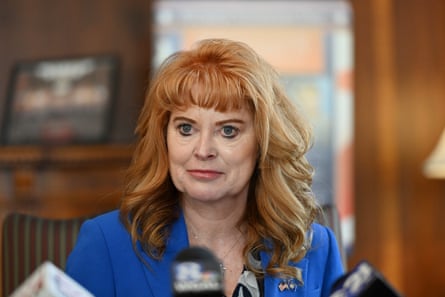 a woman in a blue suit
