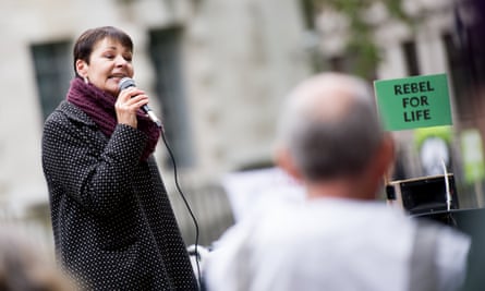 Caroline Lucas addresses Extinction Rebellion activists outside the Ministry of Defence last week.