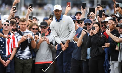 Tiger Woods plays a shot at the Presidents Cup