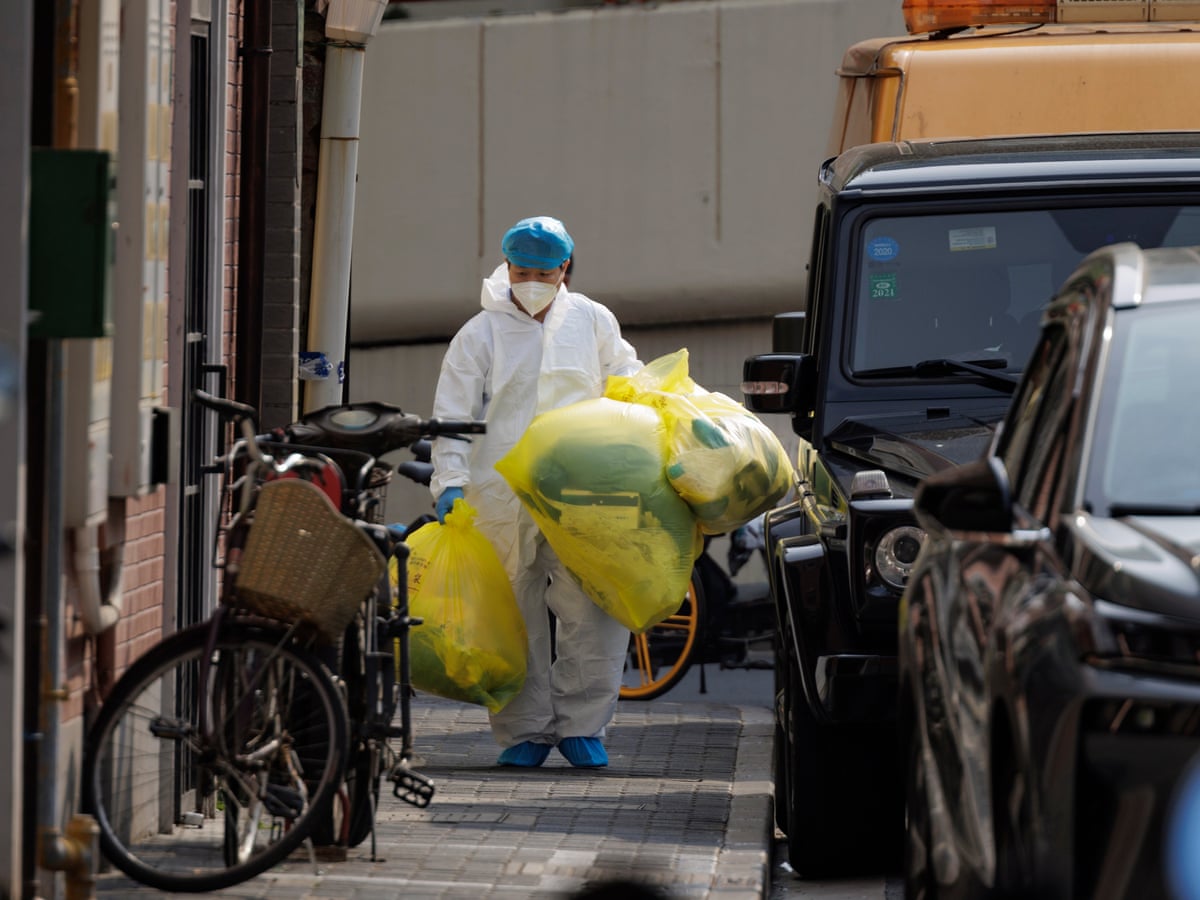 Anger in China after officials break into homes in hunt for Covid contacts | China Anger in China after officials break into homes in hunt for Covid contacts | China