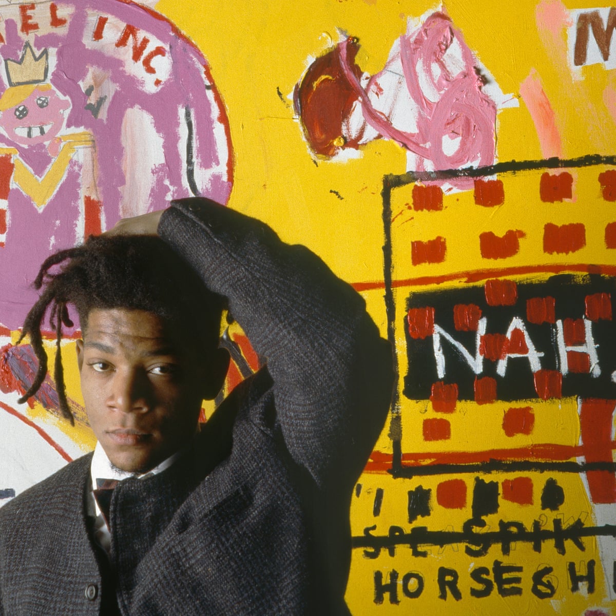 Jean-Michel Basquiat at an exhibition of his work in 1988. Photograph vt Julio Donoso via The Guardian