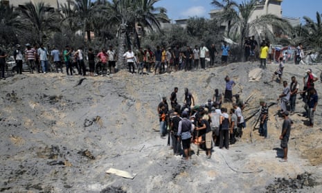 Palestinians search for bodies and survivors in a site hit by an Israeli bombardment on Khan Younis, southern Gaza Strip. Israel said it targeted Hamas’ shadowy military commander in a massive strike in the crowded southern Gaza Strip that killed at least 71 people, according to local health officials.