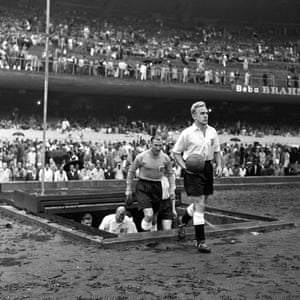 England’s captain, Billy Wright, leads his team out on to the pitch for their match against Chile at the Maracanã.
