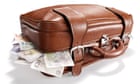 Need a bank to send money abroad? It's faster to take a suitcase of cash on a plane