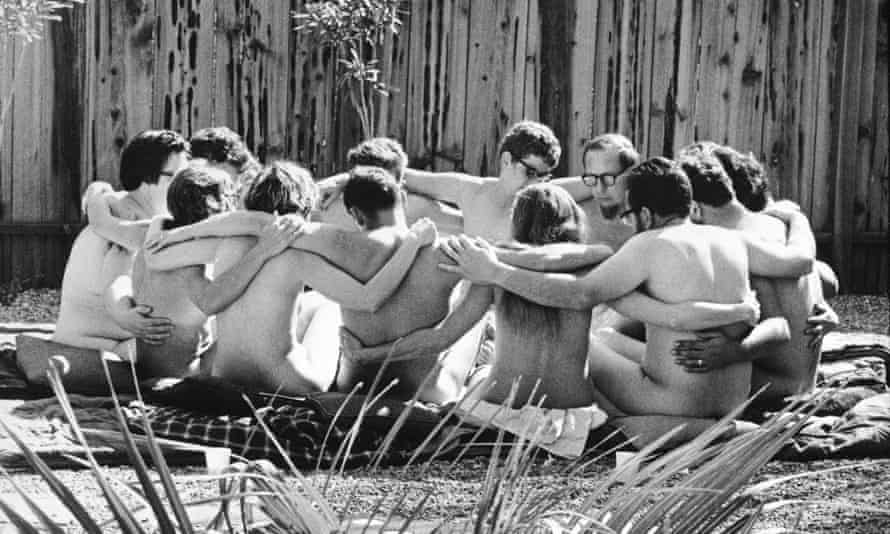Nude Encounter GroupView of participants as they sit in a circle, arms over one another’s shoulders, during a nude encounter group therapy session at the Esalen Institute, Big Sur, California, 1968. The Esalen Institute was a focal point for the Human Potential Movement, and featured a number of different workshops for attendees. This one, run by psychiatrist Paul Bindrim, was a Marathon Workshop where participants spent an extended period of time (20 - 48 hours) nude together in an effort to locate their ‘real selves.’ (Photo by Ralph Crane/The LIFE Picture Collection/Getty Images)
