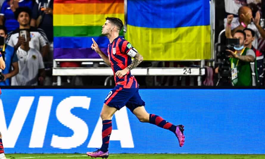Christian Pulisic celebrates after his hat-trick goal.