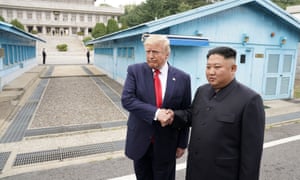 Kim and Trump shake hands after meeting.