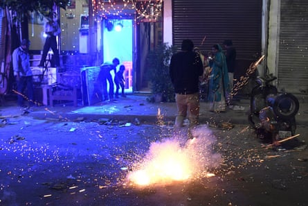 People using firecrackers celebrating Diwali Festival despite the ban imposed by the Supreme Court of India to control the air pollution in New Delhi