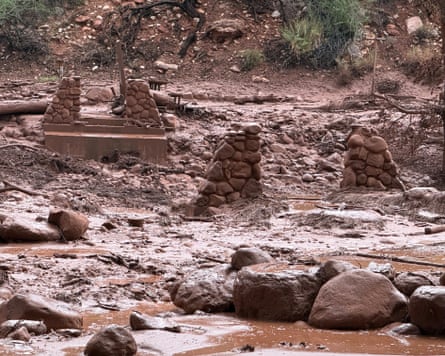 Remnants of stone bridge pylons along Bright Angel Creek after a flash flood.