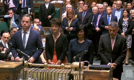 MPs line up to announce the result of a vote during the debate for the EU withdrawal bill.