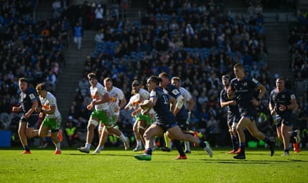 James Lowe of Leinster races away to score his side’s 10th try against Harlequins at Croke Park.
