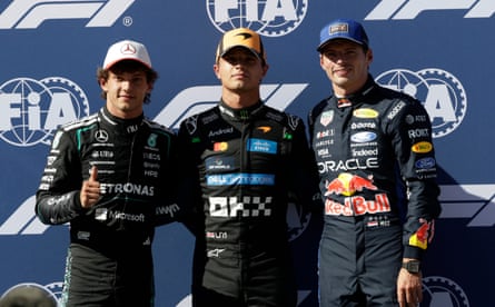 Kimi Antonelli, Lando Norris and Max Verstappen pose for pictures after qualifying for the Spanish Grand Prix.