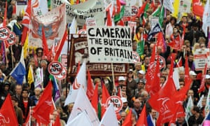 Demonstrators in London protest government spending cuts in 2011.
