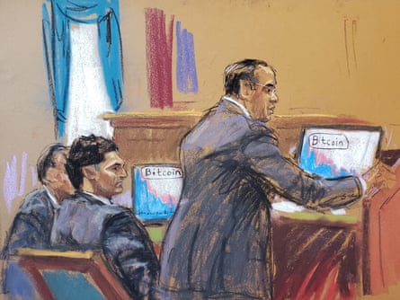 Sam Bankman-Fried watches as his defense lawyer Mark Cohen makes his opening remark in a New York City courtroom.