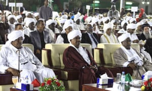 Sudanese resident Omar al-Bashir, center, attends a celebration to mark the 61st anniversary of Sudan’s independence from Britain on 31 December.