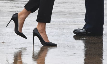 Melania Trump walks in high heels to board Air Force One in Maryland.