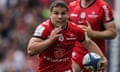 Antoine Dupont runs with the ball during the Champions Cup semi-final match between Toulouse and Harlequins