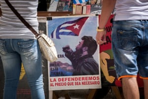 A poster of Castro is displayed at a bookstall