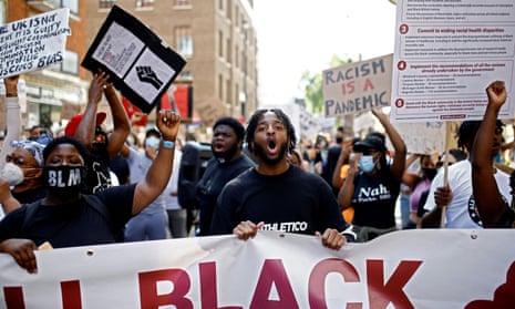 Demonstrators take part in a Black Lives Matter protest in London on 12 July 2020. 