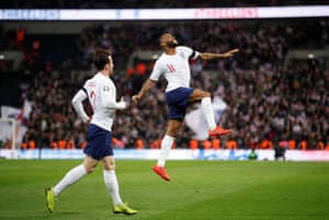 Raheem Sterling celebrates his hat trick.