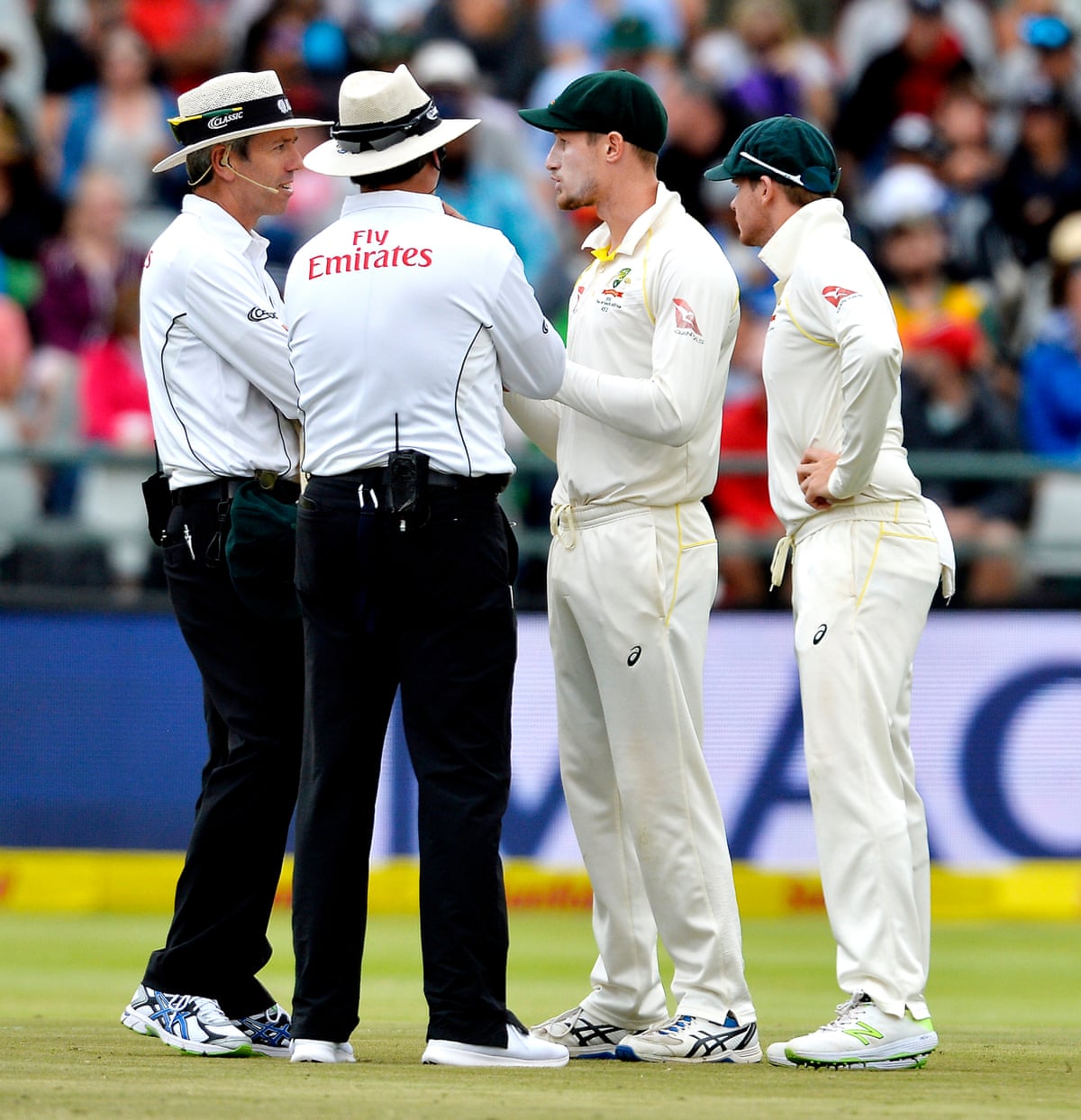 Umpires speak with Cameron Bancroft and Steven Smith at Newlands in 2018.