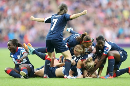 Steph Houghton is mobbed by Team GB teammates.