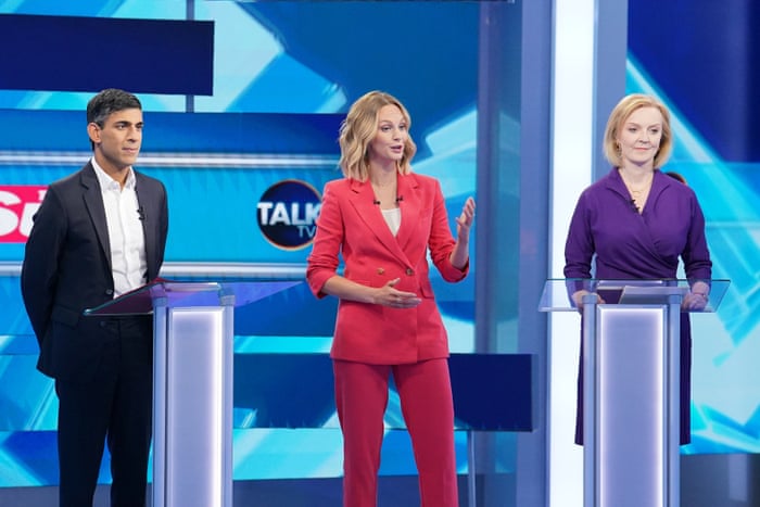 Liz Truss and Rushi Sunak with TalkTV political editor Kate McCann (centre) at the start of the debate.