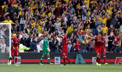 Simon Mignolet, Emre Can and Dejan Lovren looks dejected as Watford fans celebrate.