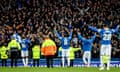 Everton fans and players celebrate