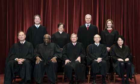 Members of the Supreme Court pose for a group photo at the Supreme Court in Washington, April 23, 2021. Seated from left are Samuel Alito, Clarence Thomas, Chief Justice John Roberts, Stephen Breyer and Sonia Sotomayor. Standing from left are Brett Kavanaugh, Elena Kagan, Neil Gorsuch and Amy Coney Barrett.