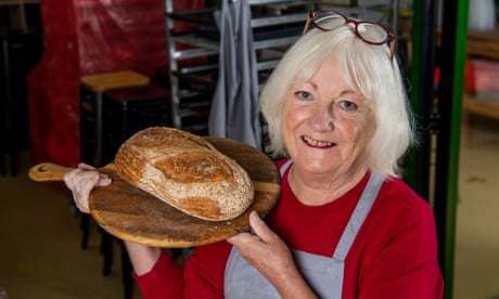 Diana Holba holding a loaf.