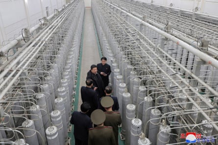 Kim tours a nuclear material production base in January.