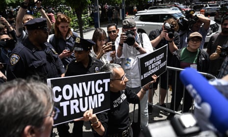 Protest in front of the Manhattan court where jury deliberations continue in Donald Trump’s hush-money trial on 30 May 2024.