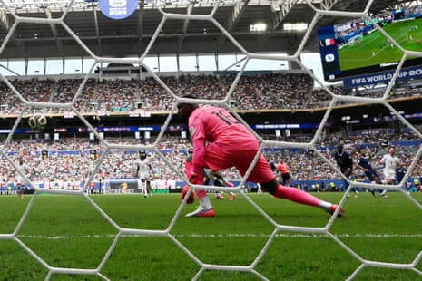 France's keeper Mike Maignan is beaten by a shot from Declan Rice to give England the lead.
