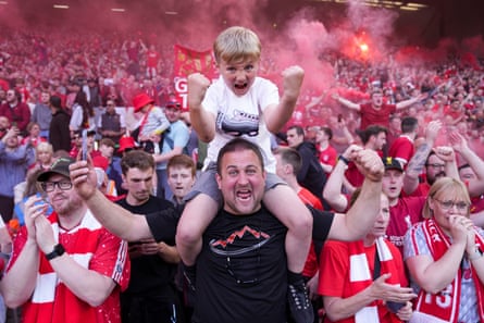 Fans celebrate as Liverpool beat Tottenham in April to secure the Premier League title.