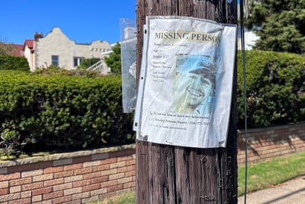 missing person flyer on telephone pole