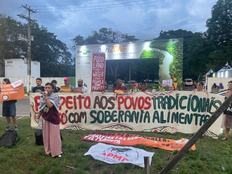 Climate protesters at the corporate-sponsored AgriZone pointed to evidence showing that industrial agriculture is a main driver of deforestation in the Amazon and produces a third of global greenhouse gas emissions.
