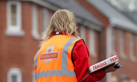A Royal Mail delivery worker in Ashford, Kent.