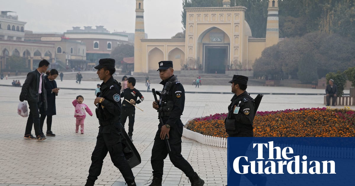 China says it will 'resolutely hit back' at US over sanctions law on Uighur abuses