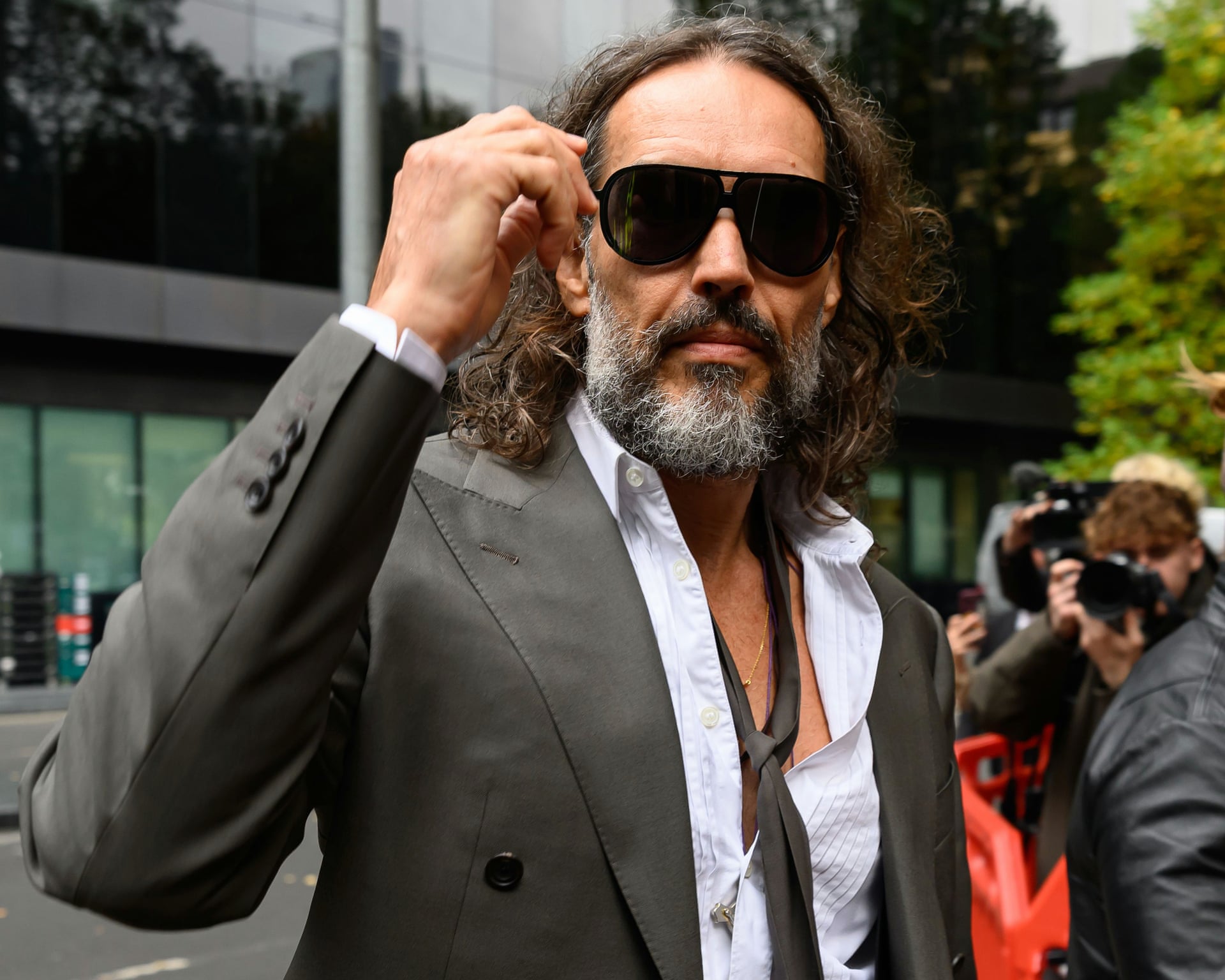 Photo: Theguardian Russell Brand faces trial after jury sworn in on rape and sexual assault charges