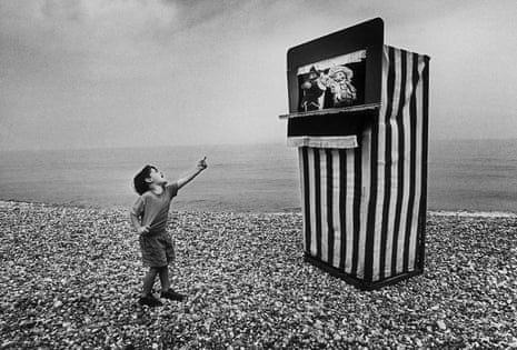 Roger Bamber’s simple, yet perfect image of a boy laughing at a Punch and Judy show on Brighton beach was part of his winning portfolio for photographer of the year in 1992.
