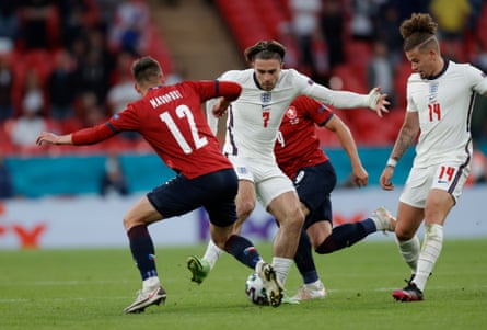 Czech players try to tackle Jack Grealish, who set up Raheem Sterling’s winner, as Kalvin Phillips looks to get involved.