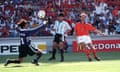 Dennis Bergkamp scores past Carlos Roa as Roberto Ayala looks on during the 1998 World Cup match between Holland and Argentina in Marseille.