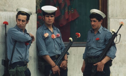 Portuguese soldiers with carnations on their uniforms and in their gun barrels in Lisbon, Portugal, 29 April 1974