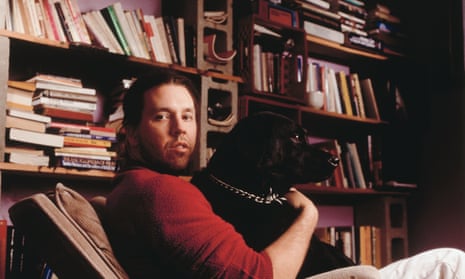 An awful lot to read ... David Foster Wallace in 1996, with his books and his dog.