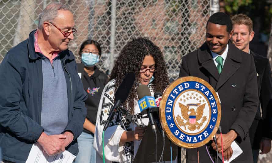 Senator Chuck Schumer, the activist Nilka Martell and Representative Ritchie Torres