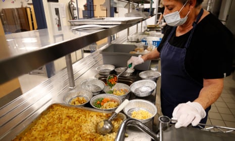 A cafeteria worker prepares lunch for students at Freedom Preparatory Academy in Provo, Utah.