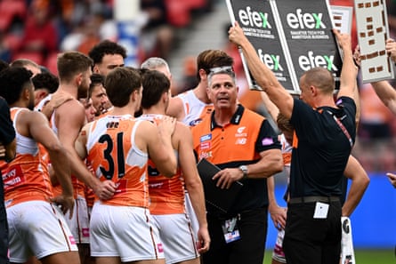 Giants head coach Adam Kingsley addresses his team at three-quarter-time.